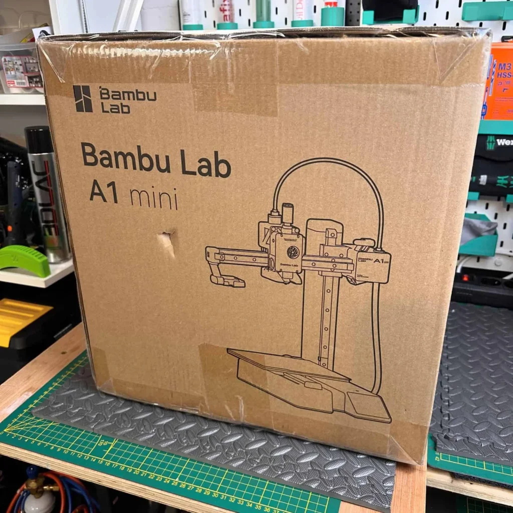 our own purchase of unboxed bambu lab a1 mini cheap 3d printer for beginners for tried and testing unboxing for several weeks to months.jpg